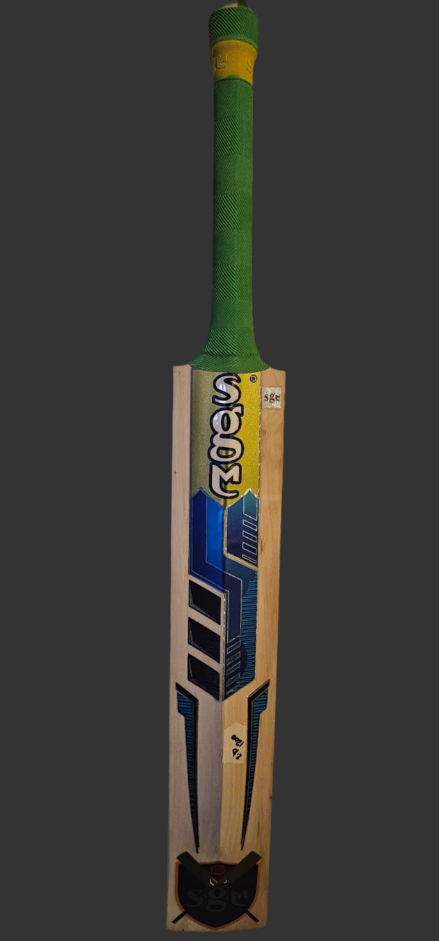 Cricket bat with a green handle and wooden head on a white surface